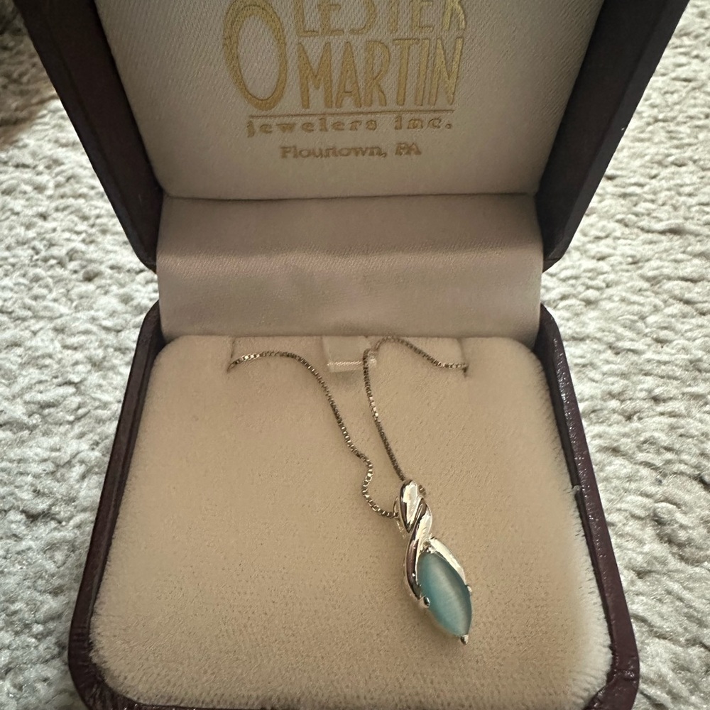 Elegant Silver Necklace with Blue Pendant